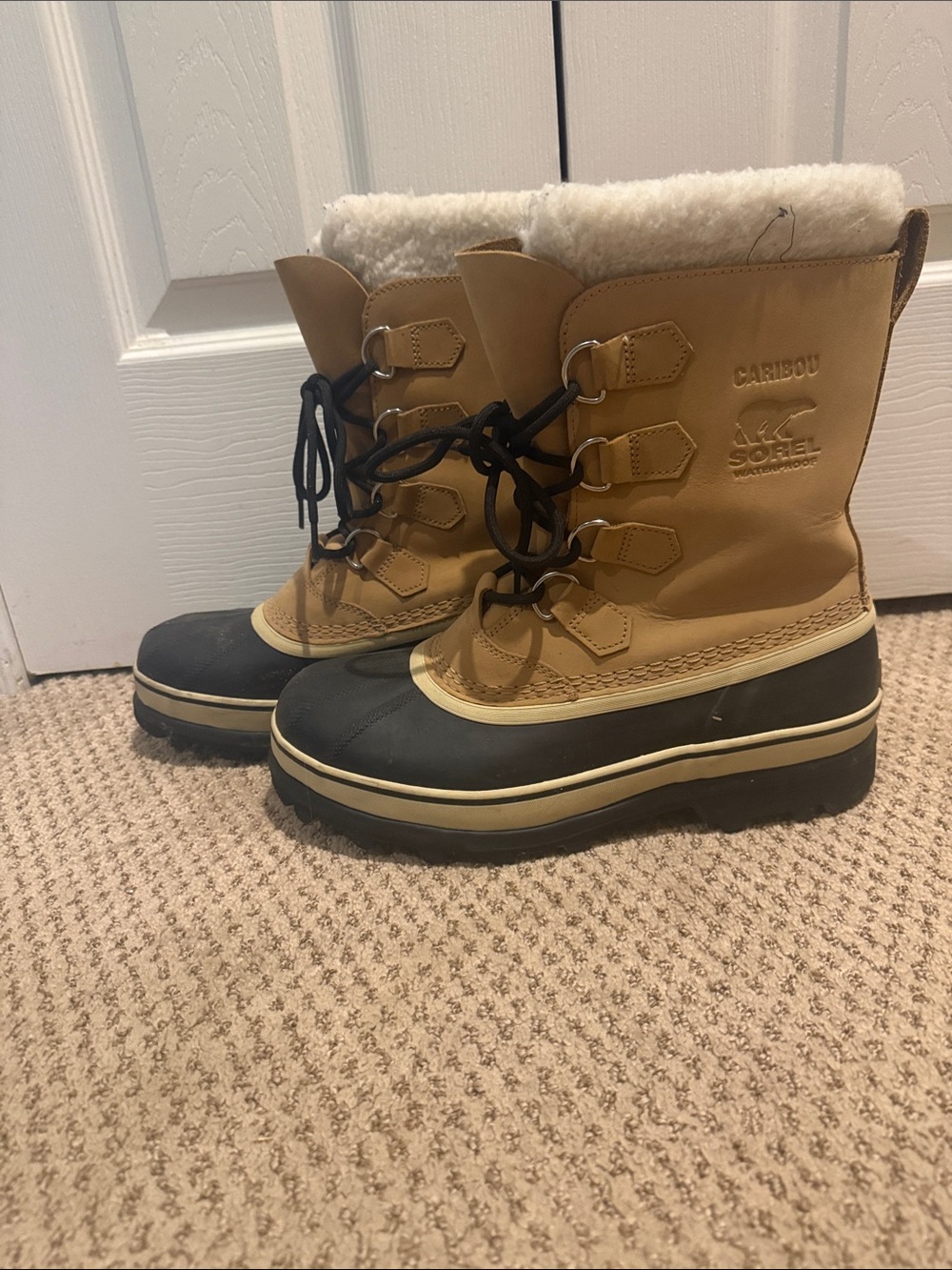 Sorel Caribou Boots in Brown and Black with White Faux-Shearling